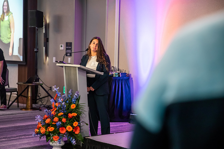 Ava Burchell &rsquo;25 emcees and speaks at the College&rsquo;s reception.
