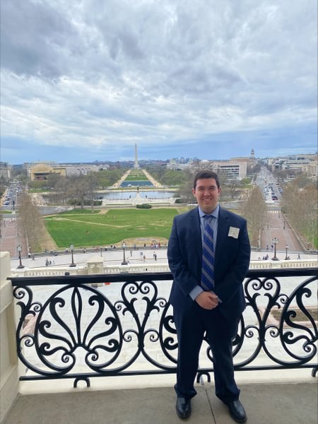 Michael Woods &rsquo;25 on the Speaker&rsquo;s Balcony during an Eisenhower trip.