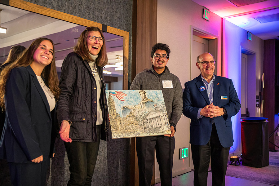 Ava Burchell &rsquo;25 with Janette Guarisco Scott &rsquo;77, Diptiman Das &rsquo;27, and President Iuliano.