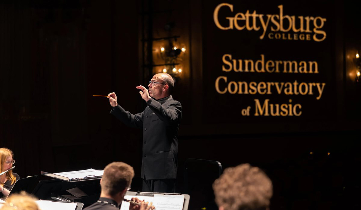 Russell McCutcheon conducting the Wind Symphony 
