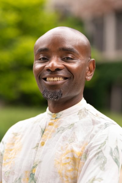 Africana Studies Prof. Hakim Mohandas Amani Williams engages students in a lecture outside Weidensall Hall.