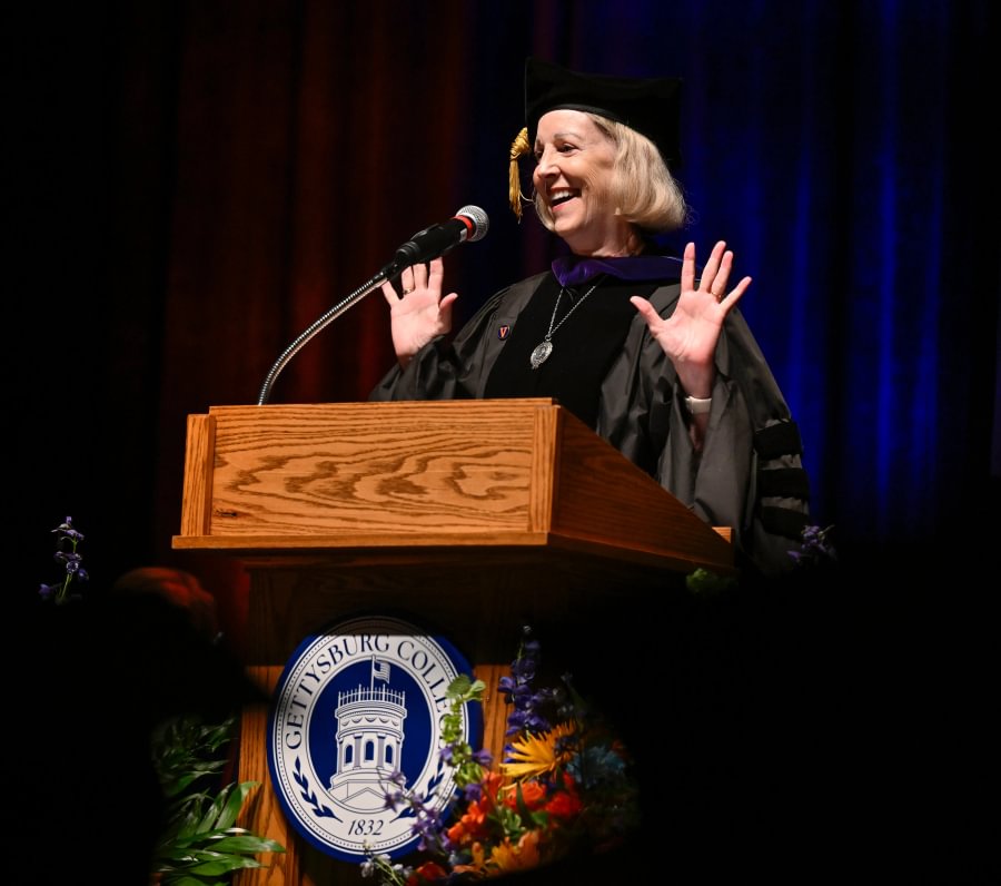 Barbara Perry speaks to graduates during the master's commencement ceremony.