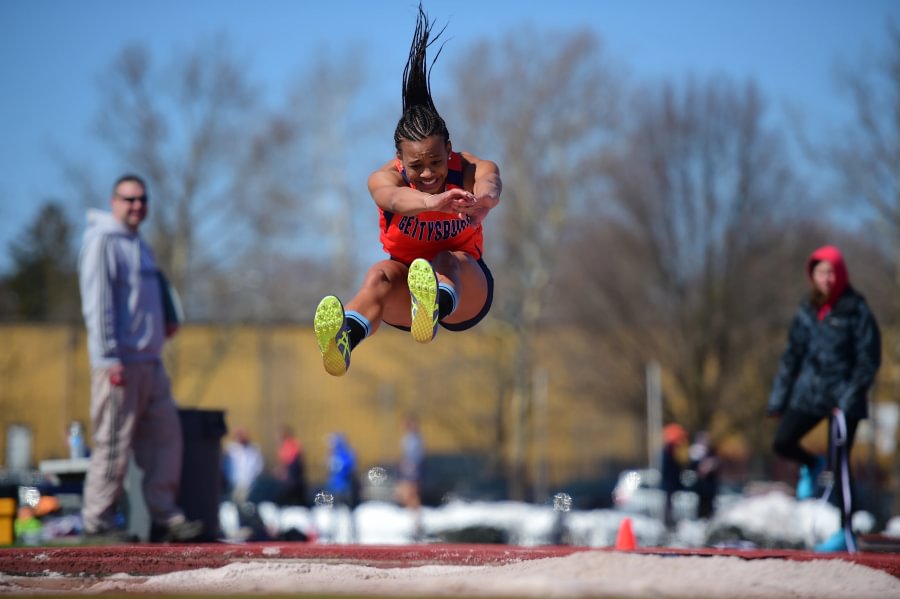 Kendra Meredith ’18 competing in the long jump at Gettysburg, where she won the event as a senior in 2018.