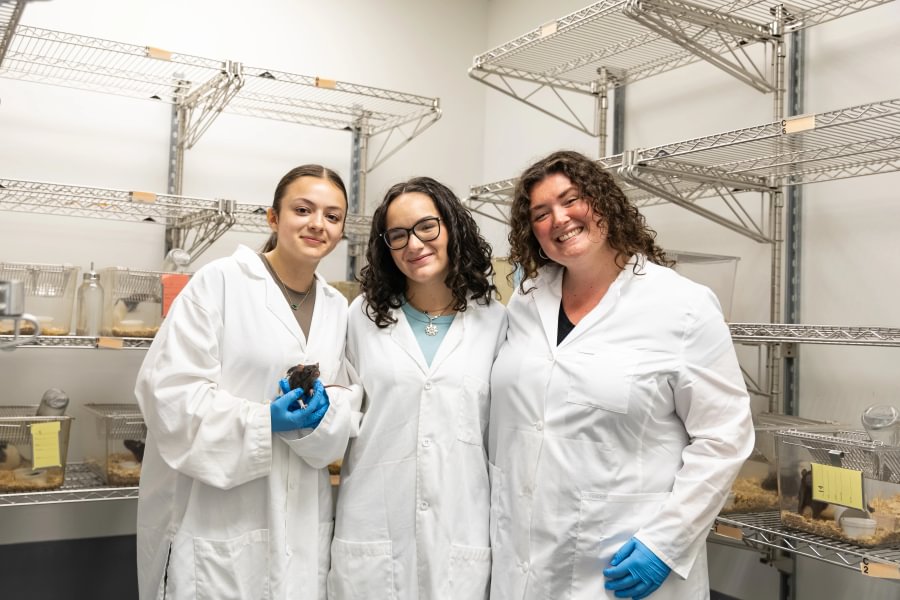 Marina Lomeli, Sophia Hume, and Megan Kane, student researchers in a psychology summer research program.