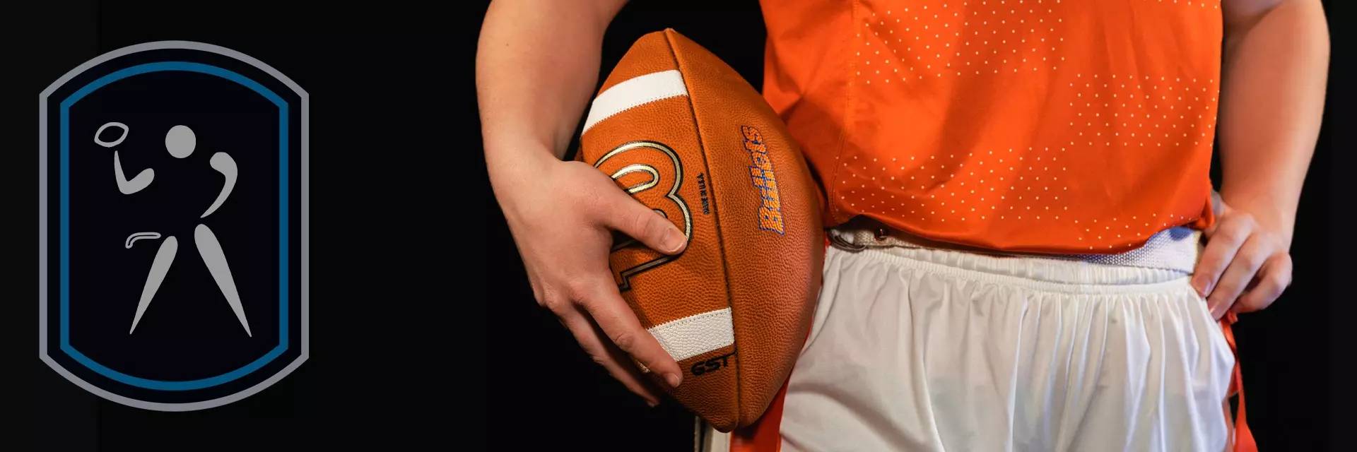Gettysburg College basketball player holding a basketball.